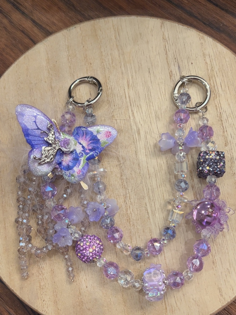 Purple Beaded Butterfly Bag Charm. Multi-Stranded with 2 lobster clasps.